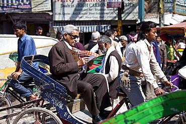 Crowded street scene at Chawri Bazar in Old Delhi, India