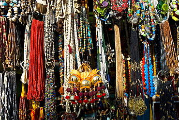 Traditional necklaces and beads on sale at street stall in Varanasi, Benares, Northern India