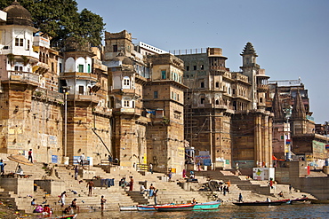 Indian Hindu pilgrims bathing in The Ganges River at Ranamahal Ghat and Chousatti Ghat in Holy City of Varanasi, India