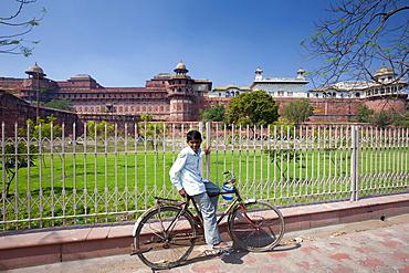 Indian boy at Agra Fort, 17th Century residence of Great Mughals and Mughal fort in Agra, Northern India