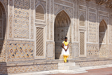 Muslim Punjabi girl at Tomb of Etimad Ud Doulah, 17th Century Mughal tomb built 1628, Agra, India