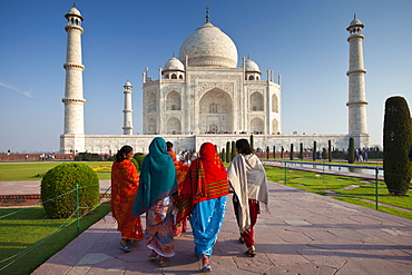 Indian tourists visiting The Taj Mahal mausoleum approach the southern view, Uttar Pradesh, India