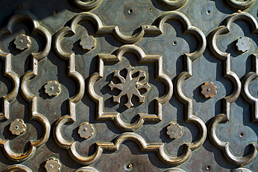 The Taj Mahal mausoleum geometric pattern detail of repousse on heavy bronze door, Uttar Pradesh, India