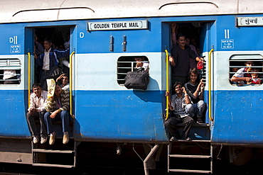 Indian people on crowded train at Bharatpur Station, Northern India