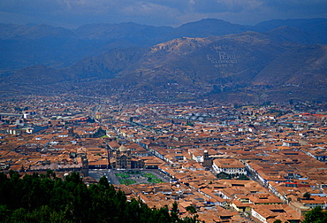 Cuzco, the ancient capital of the Inca Empire, Peru, South America viewed from above showing the Plaze de Armas and the inscription on the mountainside.