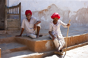 Indian men wearing traditional clothing and Rajasthani turbans in village of Nimaj, Rajasthan, Northern India