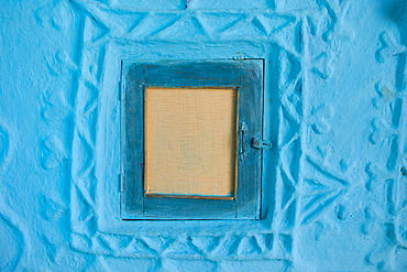 Traditional blue painted home in Hindu Brahman high caste village of Dhudaly  in Rajasthan, Northern India