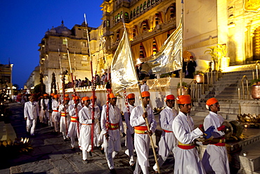 Ceremonial guard and band of 76th Maharana of Mewar, Shriji Arvind Singh Mewar of Udaipur, at Holi Fire Festival, City Palace, Rajasthan, India