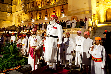 Shriji Arvind Singh Mewar of Udaipur, 76th Custodian of the House of Mewar, presides at annual Hindu Holi Fire Festival at The Zenana Mahal in the City Palace, Udaipur, Rajasthan, India. On his right is son  Lakshyaraj Singh Mewar of Udaipur, Maharaj Kumar.