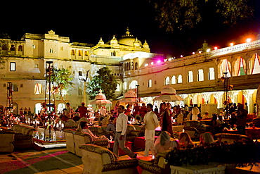 Banquet of 76th Maharana of Mewar, His Highness, Shriji Arvind Singh Mewar of Udaipur, at the City Palace to celebrate Hindu Holi Festival, Rajasthan, India. The party was in Laxmi Chowk courtyard of the Zenana Mahal (Queen's Palace)