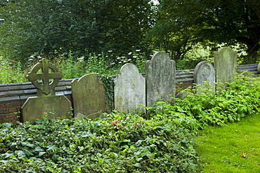 Headstones in graveyard of St Mary the Virgin Church, Harefield, Middlesex, UK