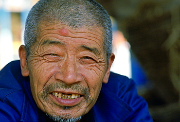 Old man in Beijing, China