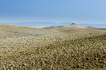 Tuscan parched landscape sun-baked soil  in Val D'Orcia, Tuscany, Italy