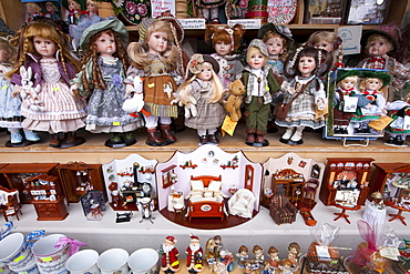 Toy shop window with dolls and traditional goods in Berchtesgaden in Baden-Wurttenberg, Bavaria, Germany