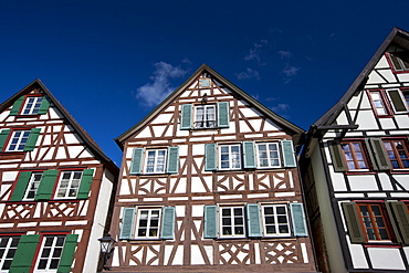 Windows and wooden shutters of quaint timber-framed houses in Schiltach in the Bavarian Alps, Germany