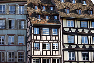 Traditional medieval architecture of canalside buildings along the Navigation Channel in the old part of Strasbourg, Alsace, France