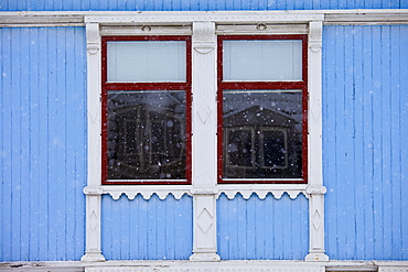 Traditional wooden buildings along Storgata in the quaint area of Tromso, in the Arctic Circle in Northern Norway