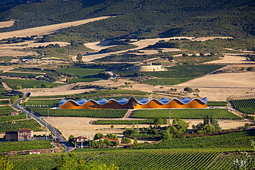 Futuristic architecture in traditional landscape Ysios Bodega winery at Laguardia in Rioja-Alaveda wine-producing area, Spain