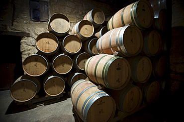 Rioja wine in American oak barrels in cave at Bodegas Agricola Bastida in Rioja-Alaveda area of Basque country, Spain