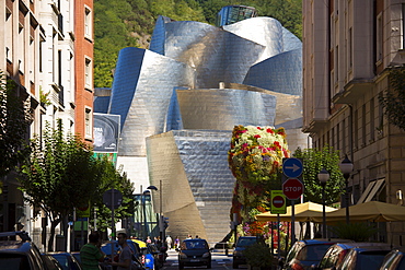 Architect Frank Gehry's Guggenheim Museum futuristic architectural design with Puppy flower feature at Bilbao, Spain