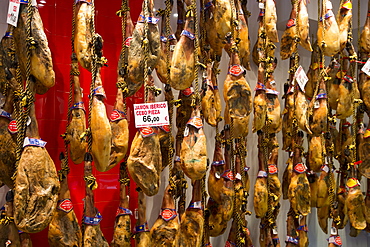 Iberico Ham and other meats on sale in food shop in Calle de Bidebarrieta in Bilbao, Spain