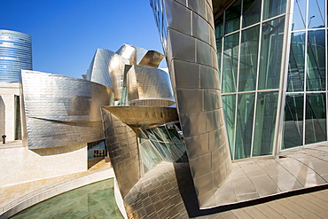 Architect Frank Gehry's Guggenheim Museum futuristic architectural design in titanium and glass at Bilbao, Basque country, Spain