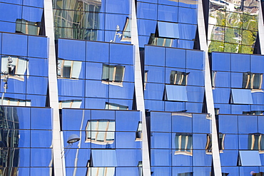 Reflections in the futuristic glass-fronted Silken Gran Hotel at Bilbao, Basque country, Spain