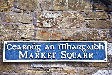 Market Square sign in Gaelic and English in quaint traditional town of Youghal, County Cork, Ireland