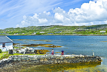 Couple enjoying the view in Connemara National Park, County Galway, Ireland