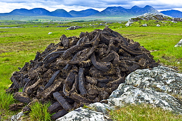 Stacked peat in turf bog on the Old Bog Road near Roundstone, Connemara, County Galway