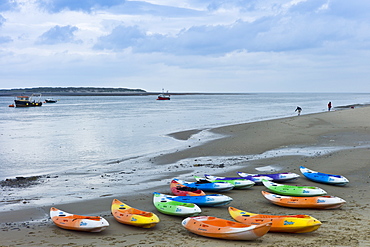 Kayaks on the beach in Aberdyfi, Aberdovey, Snowdonia, Wales