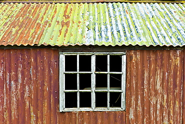 Rusty corrugated iron shed in the Cotswolds village of Bledington, Oxfordshire, UK