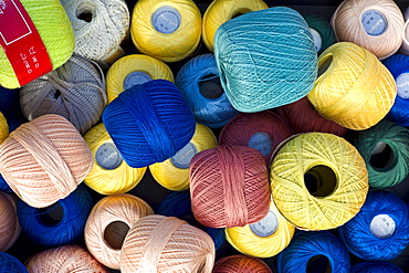 Cotton reels for crochet work on sale at street market in La Reole, Bordeaux region of France