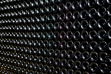 Vintage wine in underground cave at Chateau Beau-Sejour Becot at St Emilion in the Bordeaux wine region of France