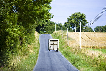 Horse lorry in country lane in Normandy France