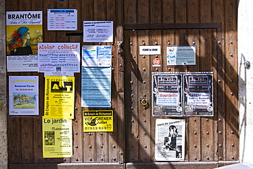 Posters in quaint town of Bourdeilles popular tourist destination near Brantome in Northern Dordogne, France