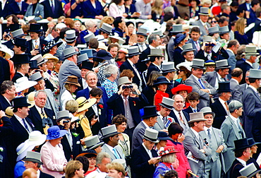 Crowd of racegoers on Derby Day at Epsom Races in Surrey, England