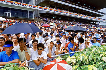 Racegoers at the racecourse in Hong Kong, China