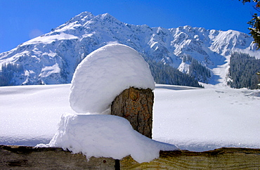 Klosters - Amongst the Silvretta group of the Swiss Alps. Deep snow on fencing