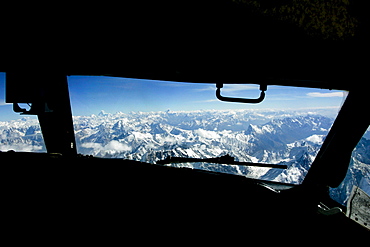 Karokoram mountains above Skardu Valley viewed from airplane cockpit in Northern Pakistan