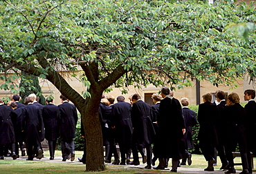 Eton schoolboys in traditional tails at Eton College, England, UK