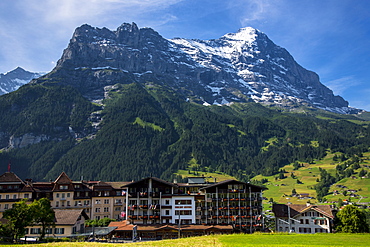 The town of Grindelwald beneath the Eiger North Face in the Swiss Alps, Bernese Oberland, Switzerland, Europe