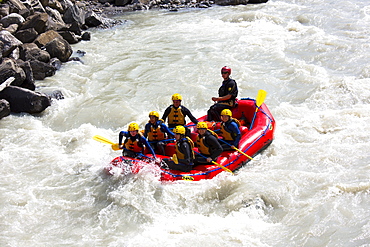 Tourists white water rafting towards Interlaken in the Bernese Oberland, Switzerland, Europe