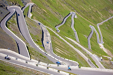 Cars on The Stelvio Pass (Passo dello Stelvio) (Stilfser Joch), on the route to Prato, in the Eastern Alps in Northern Italy, Europe