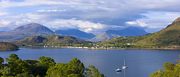 Picturesque fishing village of Shieldaig across sea loch of Loch Torridon in Argyll, Wester Ross in the Highlands of Scotland, United Kingdom, Europe