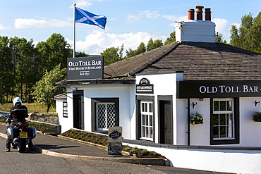 Scottish flag, the Saltire, on the First House in Scotland on the Scottish/English border at Gretna, Scotland, United Kingdom, Europe