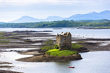 Stalker Castle on Loch Linnhe, 14th century Highland fortress of MacDougall clan at Appin, Argyll in the Highlands of Scotland, United Kingdom, Europe