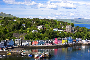 Multi-coloured buildings on the waterfront of Sound of Mull at Tobermory, Isle of Mull, Inner Hebrides, Scotland, United Kingdom, Europe