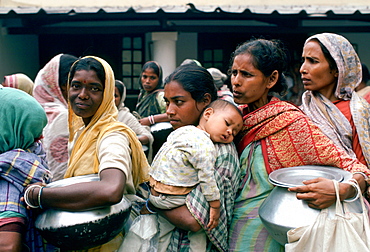 Poor women queuing for food at Mother Teresa's Mission in Calcutta,  India