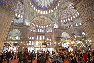 Tourists view embellished ornate domes of the Blue Mosque, (Sultanahmet Camii) (Sultan Ahmet Mosque) (Sultan Ahmed Mosque), UNESCO World Heritage Site, 17th century monument in Istanbul, Turkey, Europe